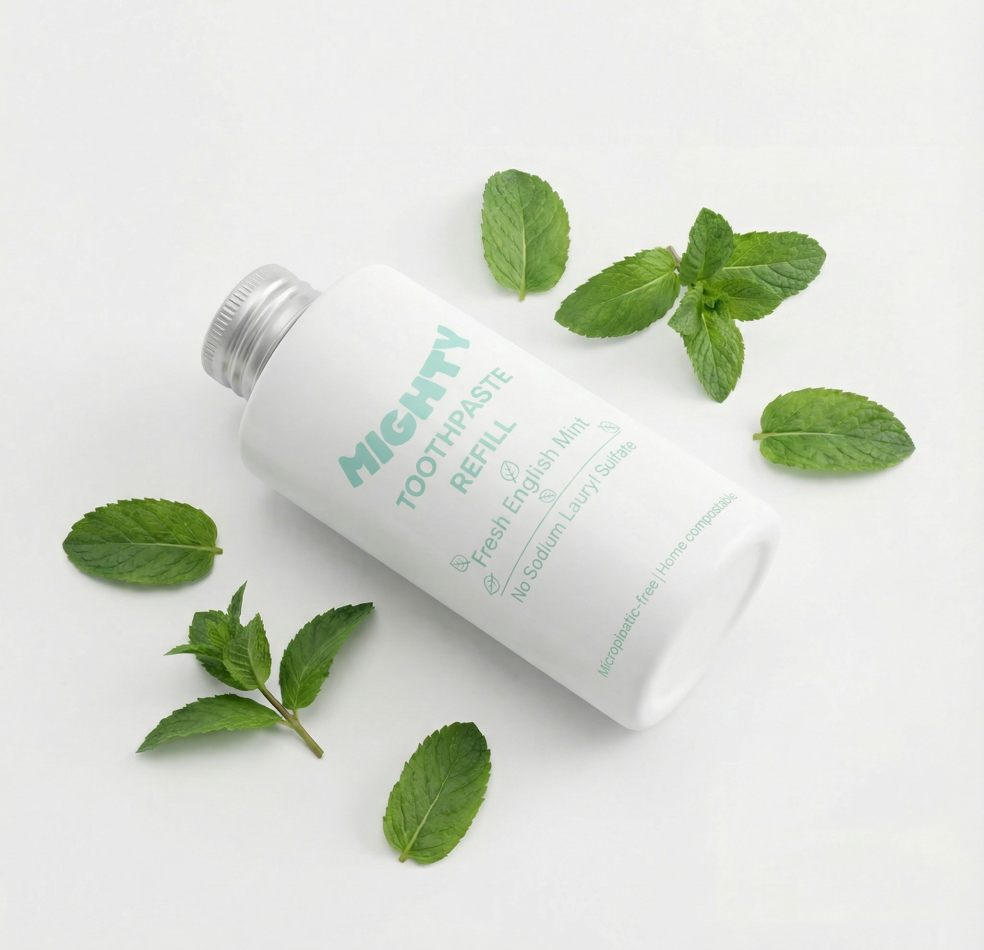 Discarded toothpaste tubes on the ground